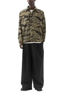 ASYMMETRICAL WOOL PLEATED PANTS - THE ROOM BY BASMATEE